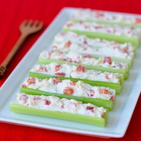 10 Recipes That Defined the 1960s — Recipes of the Decades  Stuffed Celery and Cherry Tomatoes #sixties #60s #60sparty 60s Food, Celery Recipe, Stuffed Celery, 1960s Food, Cocktail Party Appetizers, Finger Food Recipes, Celery Recipes, Fluff Desserts, Gluten Free Dishes