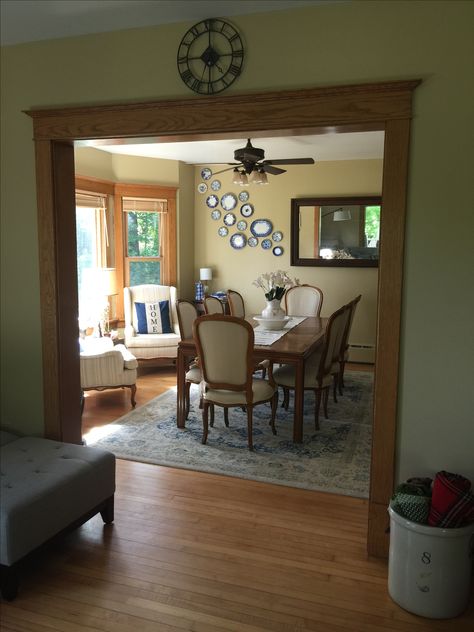 Dining room with bay window and plate wall. Dining Room With Bay Window, Room With Bay Window, Modern Farmhouse Cottage, Modern Ranch, Plate Wall, Farmhouse Cottage, Casual Dining, Dark Walnut, Ranch House