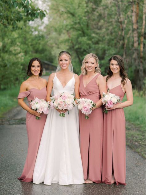 We love the dusty rose colour of these bridesmaid’s dresses and how perfect they look with the blush and white bouquets! The bouquets feature peonies, garden roses, sweet peas and ranunculus! 📷 @miltonphoto #dustyrosewedding #dustypink #bridesmaidsdresses #peonybouquets #whiteoharagardenroses #blushpeonies #peonywedding #calgary #calgarywedding #flowersbyjanie #springweddingdress #springwedding #junewedding Bridesmaid Dusty Rose Dresses, Peony Bridesmaid Dresses, Dusty Rose Bride Bouquet, Dusty Rose Pink Bridesmaid Dresses, Dusty Rose Dress Bridesmaid, Dusty Pink Bridesmaid Dress, Blush Pink Bridesmaid Dresses Dusty Rose, Bridesmaid Dresses Pink Blush, Rose Color Bridesmaid Dress