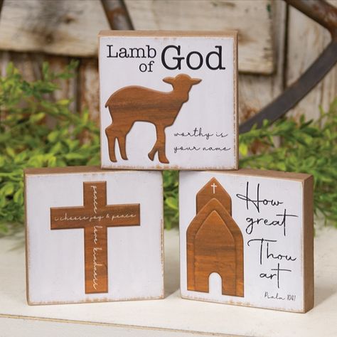 This assortment of 3 inspirational blocks features a wood-look graphic of a cross, church, or lamb and read, “Lamb of God, Worthy is your name,” “I choose joy & peace, peace love kindness,” or “How great Thou art.” Each freestanding sign is 4" square with a keyhole hanger on the back. Note: Item is sold in 3 assorted designs, not as a set. - Material: Wood - Size: 4" Sq. x 0.75" D - Color: White, Tan, Black Wooden Block Crafts, Psalm 104, The Lamb Of God, Rustic Easter Decor, Wooden Church, Rustic Easter, Lamb Of God, White Backgrounds, Block Craft