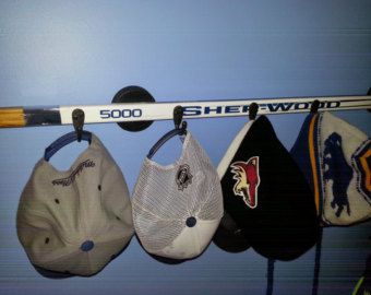 Hockey Stick Storage, Hockey Puck Display, Hockey Diy, Hockey Crafts, Stick Decor, Ice Hockey Sticks, Hockey Quotes, Pittsburgh Penguins Hockey, Hat Display