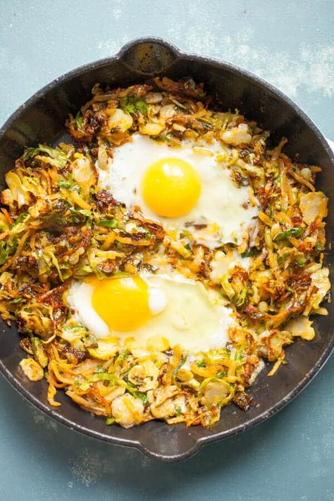 This simple Brussels Sprouts breakfast skillet has some amazing fall flavors and is my new favorite take on hash. I cook mine in a cast iron skillet with potatoes, bacon, and eggs! Dig in. | macheesmo.com #breakfast #skillet #easyrecipes #brusselssprouts Mthfr Mutation Diet, High Fiber Breakfast Ideas, Fiber Breakfast Ideas, Brussel Spouts, Keto Egg Recipes, Brussels Sprouts And Bacon, Fiber Breakfast, Sprouts And Bacon, Sauteed Brussel Sprouts