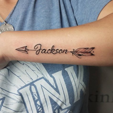 Name Tattoos With Arrows, Arrow With Name Tattoo Design, Calligraphy Name Tattoo, Arrow Name Tattoos For Women, Arrow Tattoos For Women With Name, Feather Arrow Tattoo, Typographic Tattoo, Arrow Tattoos For Women, Native American Tattoo