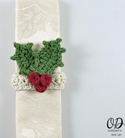 "Super easy to make - quickly add a little bit of handmade to your Christmas or holiday table setting with this quick napkin ring. Embellish with your favorite embellishment or with the holly embellishment." Crochet Napkin Holder, Xmas Crochet, Holiday Napkin Rings, Holiday Crochet Patterns, Crocheted Christmas, Crochet Wreath, Christmas Napkin Rings, Silverware Holder, Patterned Napkins