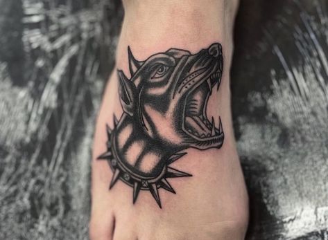 Done by @ charlie_black_tattoo in allstar tattoo, Limerick, Ireland Blackwork traditional foot tattoo, doberman, spiked collar, barking Doberman Knee Tattoo, American Traditional German Shepherd Tattoo, Traditional Foot Tattoo, Doberman Flash Tattoo, Traditional German Shepherd Tattoo, Barking Doberman Tattoo, Traditional Doberman Tattoo, Doberman Tattoo, Spiked Collar