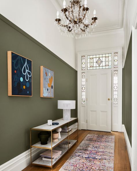 Deeper greens like Dulux Mangrove can be used to easily create a statement design feature. Purchase a swatch or sample from the Dulux Colour Shop to see the colour come to life in your home.    Stylist: Julia Green Stylist  Photographer: Armelle Habib Photography Dulux Hallway, Hallway Wall Colors, Green Hallway Ideas, Hall Colour, Hallway Paint, Hallway Colours, Green Hallway, Hallway Designs, Green Walls