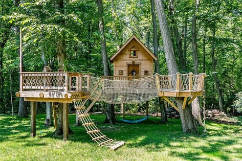 190 Sunset Rd, Oyster Bay, NY 11771 | MLS #3329819 | Zillow Tree House Playground, Backyard Diys, Secret Hideout, Warped Wall, Tree House Plans, Tree House Diy, Play Garden, Playground Set, Tree House Kids