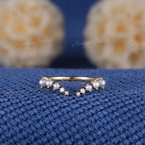 This Wedding Bands item by acraisejewelry has 989 favorites from Etsy shoppers. Ships from San Francisco, CA. Listed on May 14, 2024 Wedding Band With Different Shaped Diamonds, Unique Ring Sets Wedding, Diamond Ring With Pearl Band, Wedding Band Shapes, Pearl Wedding Band Stack, Gold Pearl Wedding Band, Pearl Ring Band, Open Rings Design, Ethereal Wedding Band