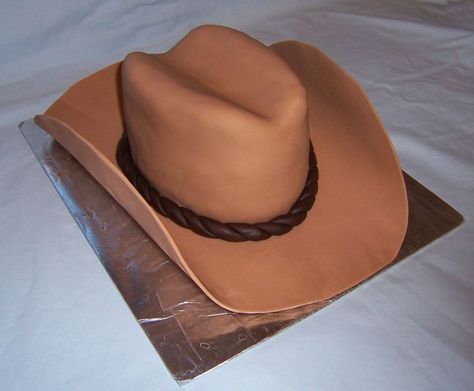 Cowboy Hat Cake Chocolate layer cake covered in fondant. Thanks to TheCakeMaker for the wonderful advice! For my dad, the cowboy. :) Fondant Cowboy Hat, Cowboy Hat Cake Topper, Make A Cowboy Hat, Cowboy Hat Cake, Western Theme Cakes, Cowboy Birthday Cakes, Man Cakes, Cowgirl Cakes, Grandad Birthday