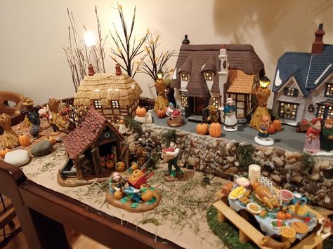 Thanksgiving Village with Dept 56 Dickens Village Houses. Used boxes for the upper level. The sidewalk is stair tread gripper. Thanksgiving Village, Fall Village, Cottage Village, Sullivan Family, Diy Cottage, Dept 56 Dickens Village, Miniature Village, Fall Fairy, Edna Mode