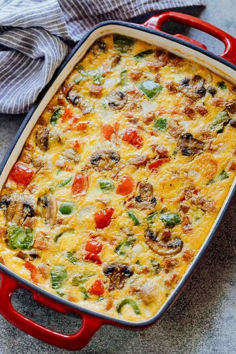 Baked Denver Omelet Breakfast Casserole in a baking dish straight out of the oven Denver Omelet, Resep Makanan Beku, Low Carb Breakfast Casserole, Menu Sarapan Sehat, Liver Care, Omelets Recipe, Feed A Crowd, Quiche Recipes, Breakfast Recipes Casserole