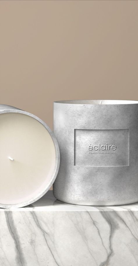 Éclairé is a French word meaning "enlightened" — and when you support Éclairé by buying their candles, you will feel enlightened for having supported a planet-conscious small business.

The branding for éclairé is classic but unique, with custom typography in the logo suite to represent lit candles. Extra brand collateral is shown through a candle packaging mockup and a home page web design. Large Candle Centerpieces, Home Page Web Design, Candle Packaging Design, Brand Collateral, Contemporary Candles, Logo Suite, Velas Candles, Cement Candle, Classic Branding