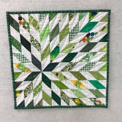 Supernova Quilt, Orange Quilt, Mini Quilt Patterns, Whoop Whoop, Straight Line Quilting, Half Square Triangle Quilts, Quilt Care, Miniature Quilts, Green Quilt