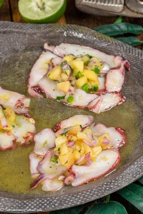 This octopus appetizer will transport your taste buds right to the Caribbean Islands.  A lovely dish you will make again and again. #octopusrecipe #caribbeanfood #octopuscarpaccio #appetizer #internationalcuisine #worldfood Octopus Carpaccio Recipe, Octopus Appetizer, Caribbean Octopus, Octopus Ceviche, Octopus Carpaccio, Octopus Salad, Octopus Recipes, Salsa Ingredients, Island Food