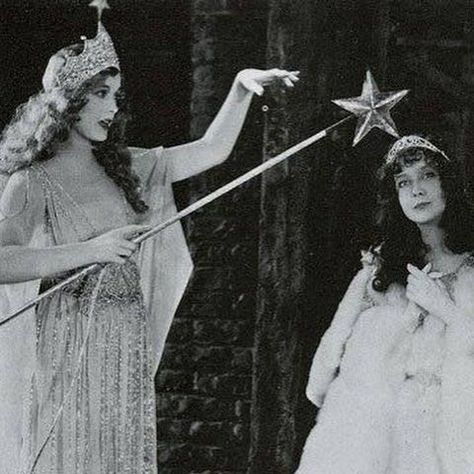 ᴛʜᴇ ᴄᴏʀsᴇᴛᴇᴅ ʙᴇᴀᴜᴛʏ | Betty Bronson (Cinderella) and Esther Ralston (Fairy Godmother) in “A Kiss for Cinderella” (1925) , based on J.M. Barrie’s 1916 stage play... | Instagram Fairy Godmother Costume, Silent Film Stars, Silent Movie, Poses References, Fairy Godmother, Silent Film, A Kiss, Silver Screen, Old Movies