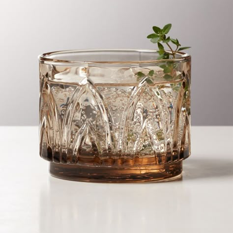 Shop Buchanan Smoked Stacking Double Old-Fashioned Glass. Low-riding old-fashioned made of pressed glass etches around in detailed arches that feel totally vintage. Footed base makes stacking and storing a breeze. Pair with our Buchanan Cocktail Mixing Glass for full bar service. CB2 exclusive. Salon Suites, Bar Service, Old Fashioned Glass, Cocktail Glass, Bar Drinks, Drinking Glass, Dream House Decor, Drinking Glasses, Pressed Glass