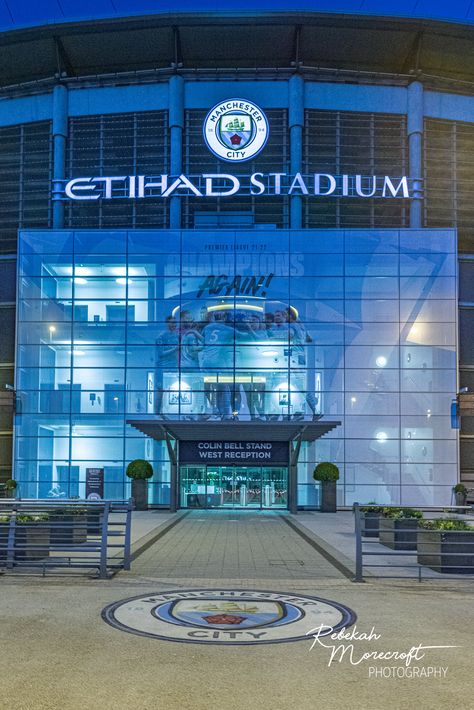 "Manchester City FC West Reception. I am a professional photographer from Manchester, and my stepson developed a love for Man City FC and Haaland. Inspired by his enthusiasm, I decided to capture some pictures of the iconic Etihad Stadium. After patiently waiting for the perfect weather and a day when we could bring my stepson along, we finally visited the stadium on May 7th.  As we explored, we couldn't help but notice the numbers \"93:20\" displayed on what seemed to be a digital clock. We wer Etihad Stadium Aesthetic, Manchester City Stadium, Etihad Stadium Wallpaper, Man City Aesthetic, Manchester City Aesthetic, Man City Stadium, Man City, City Of Manchester Stadium, Manchester City Wallpaper