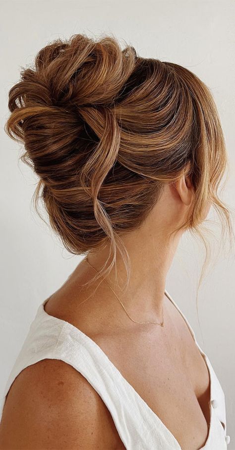 chic updos, updos, updo hairstyle, cute updo, simple updo, chignon, high updo Low Bun Wedding Hair Brunette Messy Updo, Messy Updo For Wedding, Loose Chignon Updo, Loose High Updo Wedding, Tousled High Bun, High Messy Bridal Updo, Updo Hair Wedding Guest, Hair Updos Elegant, Wedding Reception Updo