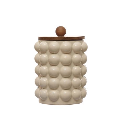 PRICES MAY VARY. Organize any kitchen with style using this round stoneware canister with a charming raised dot pattern and acacia wood lid that provides a natural and rustic touch, keeping any food fresh and protected With raised dots, an acacia wood lid, and a clean white color, this stoneware canister seamlessly blends into various kitchen styles, from modern farmhouse to contemporary, and can be displayed on countertops, shelves, or islands Designed for dry food storage, this canister is per Dry Food Storage, Creative Co Op, Crackle Glaze, Kitchen Canisters, Dots Design, The Grove, Dots Pattern, Kitchen Style, Acacia Wood