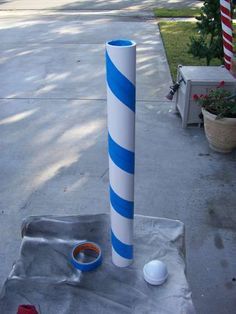 Pvc Candy Cane Outdoor Christmas, Large Candy Cane Decorations Diy, Diy North Pole Post, North Pole Sign, Candy Cane Crafts, Pole Sign, Candy Cane Decorations, Foam Paint, Christmas Parade