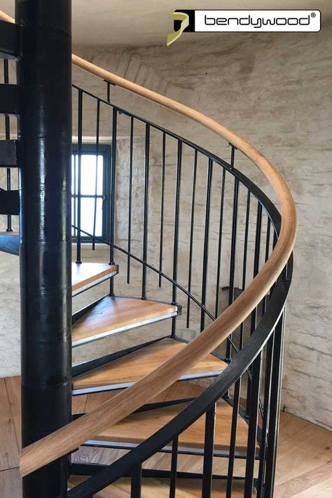 Spiral staircase with solid wooden handrail in Bendywood®-oak. Steel Curved Staircase, Curved Staircase Handrail, Round Handrails For Stairs, Staircase Design Round, Wooden Handrails For Stairs, Round Staircase Design, Round Stairs Design, Staircase With Landing, Stairs Minimalist