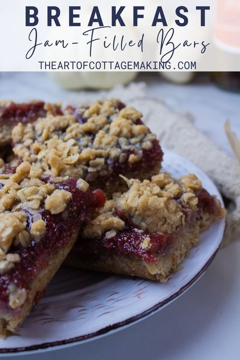 Breakfast jam-filled bars are piled high on a plate with mini white pumpkins in the background. Oat Jam Bars, Sourdough Breakfast Bars With Jam, Oatmeal Jam Bars, Breakfast Bar Recipe, Jam Bar, Easy Breakfast Bar, Sweet Oatmeal, Homemade Granola Bar Recipe, Oatmeal Bars Recipes