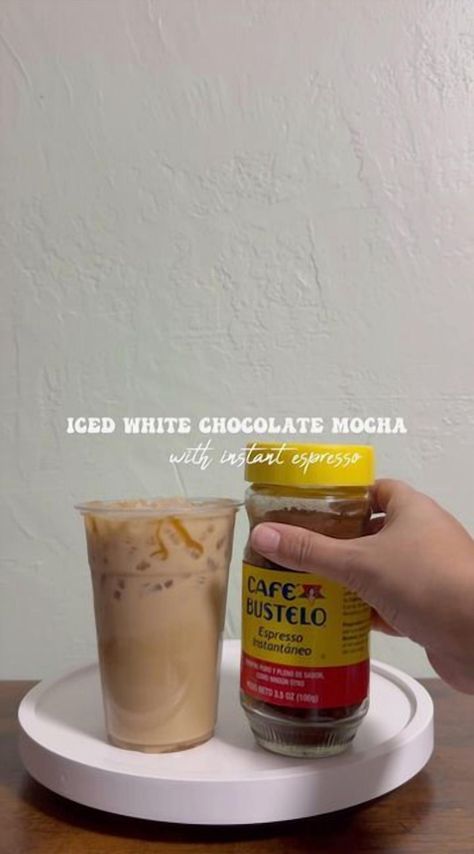 Indulge your coffee cravings with this simple and refreshing iced white chocolate mocha recipe. Perfect for a quick pick-me-up, this delightful drink combines the rich flavors of white chocolate and the bold kick of instant espresso. Whether you're a coffee aficionado or just looking for a sweet treat, this easy-to-make recipe will become your go-to favorite. Enjoy a café-quality beverage at home with minimal effort and maximum flavor. Instant Expresso Recipe, Bustelo Coffee Recipes, Instant Coffee Drinks, Instant Espresso Drinks, Instant Espresso Iced Coffee Recipe, Iced White Chocolate Mocha At Home, Nescafé Gold Espresso Recipes, Cafe Bustelo Iced Coffee, Instant Espresso Iced Coffee