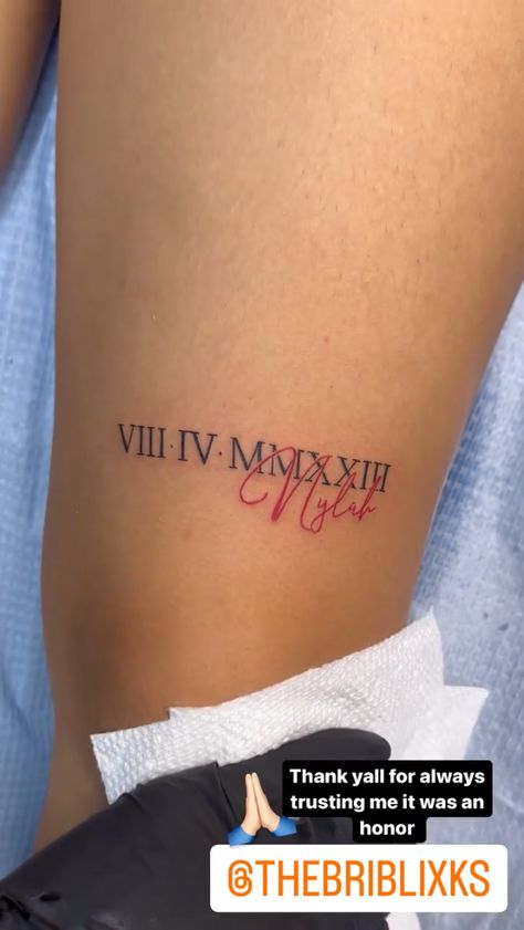 No Regret Tattoos, Memorial Chest Tattoo Female, Roman Numeral Tattoo Ribcage, Moms Name Tattoo Ideas Daughters, Names In Cursive Tattoos, Thigh Name Tattoo Women, Tattoo Name Ideas Female, Nephew And Aunt Tattoo Ideas, Word Thigh Tattoo Women