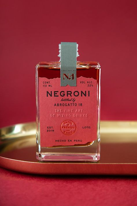 Negroni Abrogatto 18 packaging | Communication Arts Drinks Packaging Design, Bottle Design Packaging, Alcohol Packaging, Drinks Brands, Cool Packaging, Alcohol Bottles, Wine Packaging, Premium Packaging, Packaging Labels Design