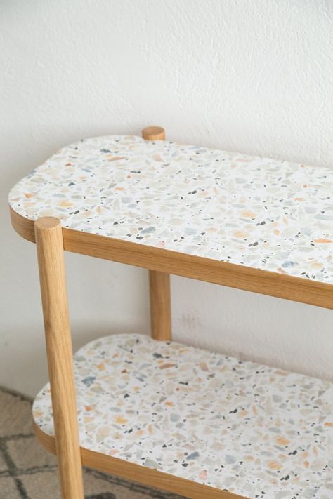 Easy IKEA Hack Console Table Using Removable Wallpaper | Hunker Wallpaper On Table, Jesmonite Furniture, Wallpaper Table Top, Ikea Console Table Hack, Gladom Ikea, Ikea Console, Ikea Console Table, Terrazzo Table Top, Terrazzo Furniture