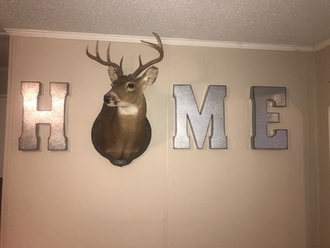 Deer head home sign Home With Deer Head, Dear Head Decor, Deer Head Decor Living Room Farmhouse, Deer Mounts In Living Room Farmhouse, Deer Mounts In Living Room, Hunting Living Room, Deer Heads Living Room, Decorating With Deer Mounts, Hunting Decor Living Room