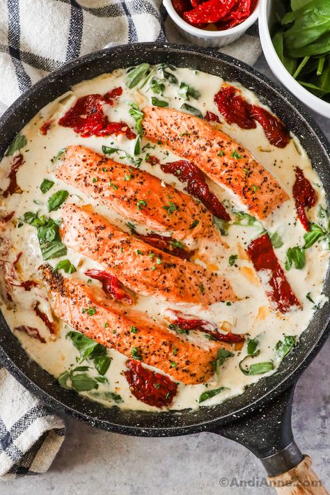 Tuscan Salmon With Sun Dried Tomatoes, Spinach and Basil Salmon With Sundried Tomato Cream Sauce, Salmon Pesto Pasta, Stuffed Flounder, Tuscan Salmon Recipe, Tuscan Salmon, Salmon Spinach, Sauce For Salmon, Creamy Parmesan Sauce, Pizza Salad