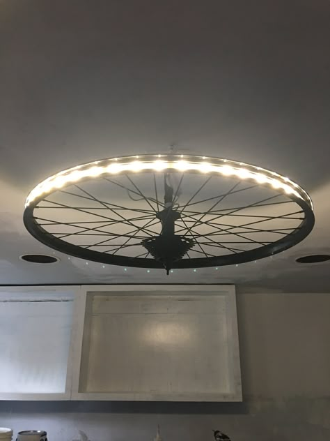 Bicycle Wheel Decor, Bicycle Parts Art, Wheel Lamp, Tube Lighting, Recycled Bike Parts, Man Cave Lighting, Bike Room, Car Part Furniture, Wheel Decor