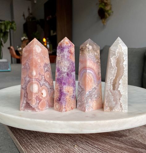 Selection of high quality, mini druzy pink and purple amethyst flower agate towers. EXCEPTIONAL patterning. Natural, imported stone/crystal products from Madagascar. Tower A Height: 4 inches Weight: 217 grams (0.48 lbs) Tower B Height: 4 inches Weight: 110 grams Tower C Height: 4 inches Weight: 137 grams Tower D Height: 4 inches Weight: 124 grams "Pink amethyst flower agate emits calmness, trust and grace. This stone assists with moving one towards emotional balance and overall peace. It increas Crystal Products, Increase Intuition, Crystal Towers, Amethyst Flower, Pink And Purple Flowers, Green Jasper, Cool Rocks, Flower Agate, Gadgets And Gizmos