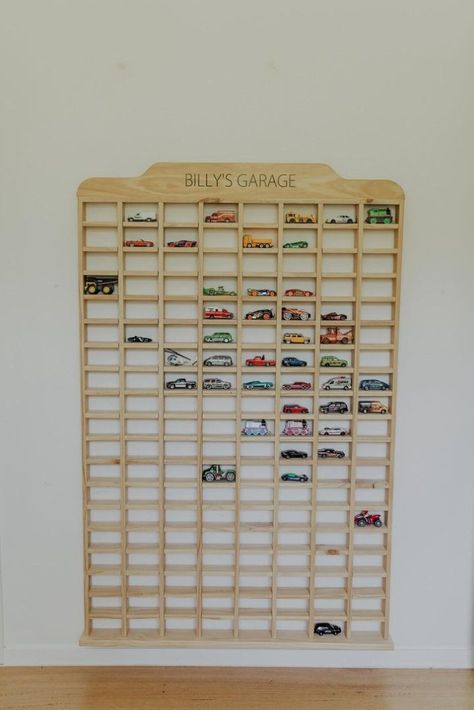 Keep that car collection tidy & organised. Our Matchbox storage is the perfect addition to your little ones bedroom, or toy room, and makes clean up time not so boring. For that extra special touch, add personalisation (enter above, if not selected there will be no wording on it). Hang it on the wall, or have it free standing (in this case we recommend it is fixed to the floor or the wall to ensure safety). We can make it any size, or shape. Clic Dinky Car Storage Ideas, Diy Car Storage For Kids, Car And Truck Toddler Room, Cars And Dinosaur Room, My Garage Toy Cars, Playroom Car Storage, Toy Car Garage Ideas, Neutral Car Bedroom, Kids Car Room Ideas