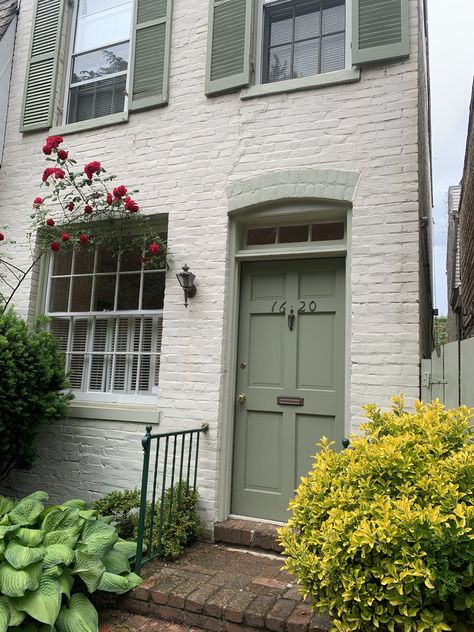 Cream And Sage House Exterior, White House Sage Trim, Pistachio House Exterior, Cream House With Green Trim, Cream House Green Trim, White House With Sage Trim, Light Roof Color, Green Rendered House Exterior, Cream House Green Door