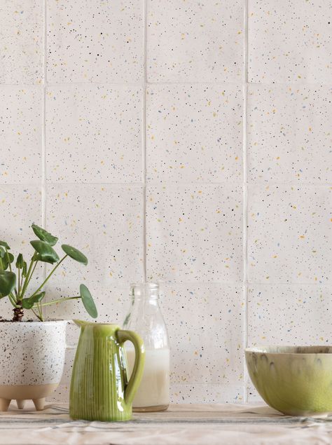 The random splatter effect of this speckled wall tile has an organic style that is achieved by hand at the workshop. The base tile colour varies from a lovely subtle lemon to a milky cream. Speckled Tile, Terrazo Tile, Cream Backsplash, Kitchen Tile Diy, Harris House, Wet Room Flooring, Tile Splashback, Glazed Brick, Bathroom Shower Walls