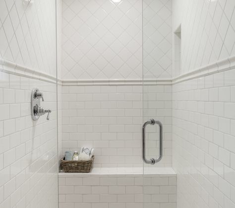 All white walk-in shower with diamond laid square tile upper wall over tile chair rail accenting the lower wall clad in subway tile with a built-in tiled bench White Tile Shower, Tiled Bathroom, Subway Tile Showers, Shower Wall Tile, Bathroom Shower Walls, Master Shower, Tiled Shower, Shower Chair, Transitional Bathroom