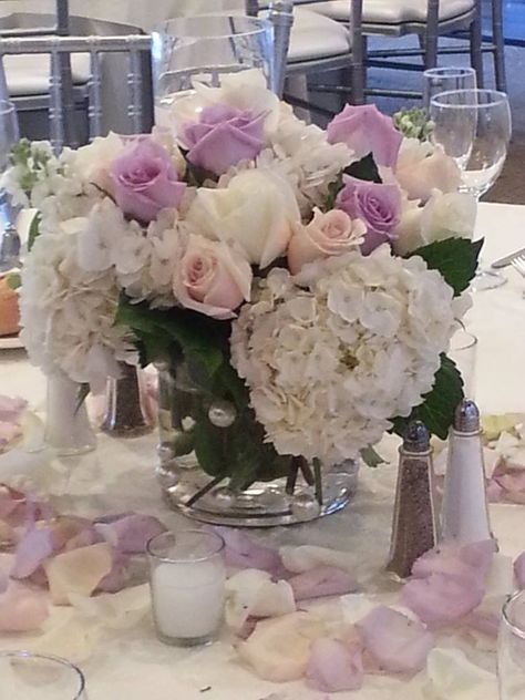 wedding centerpieces of white hydrangea, lavender and Sahara roses Hydrangea Roses Centerpiece, Hydrangea And Rose Centerpiece Wedding, Purple Hydrangea Centerpieces, Lavender Wedding Centerpieces, Carnation Centerpieces, Rose Centerpieces Wedding, Hydrangea Centerpiece, Event Centerpiece, Light Pink Rose