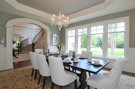 Traditional dining room with sage green paint color, octagon tray ceiling, arched doorway, salvaged wood dining table, white tufted dining chairs, wainscoting and Visual Comfort Lighting Small Faceted George II Chandelier. Dining Room Tray Ceiling, Tray Ceiling Paint Ideas, Dining Room Paint Colors, Green Dining Room, Transitional Dining Room, Traditional Dining Rooms, Dining Room Paint, Dining Room Ceiling, Traditional Dining