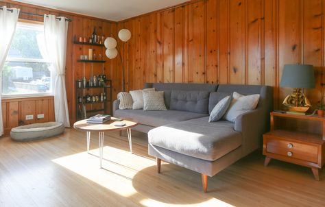 Drop the Paint Brush: Wood Paneling is Officially Cool Again — Rooms That Get It Right Interior Design Wood Paneling, Upgrading Wood Paneling, Brown Wood Paneling Living Room, Brown Paneling Walls Makeover, Brown Paneling Walls, Mid Century Wood Paneling Living Room, Brown Paneling Walls Decor, Brown Panel Walls Living Room, Styling Wood Paneling