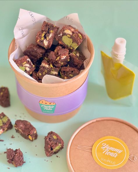 Chunky Choc Pistachio Cookie Tub Is NOW LIVE 💚 Indulge in our gourmet Chocolate Pistachio Chunky Cookies, baked with rich Belgian chocolate and real pistachios 🤩 Enjoy a delicious flavor explosion with every bite! Order your tub for delivery in 🇦🇪 #ShopNow : https://sugaholic.com/desserts/Chunky-Cookies/pistachiocookietub #Sugaholic #cookiesindubai #cookietubs #chunkycookies Brownies Bites, Pistachio Cookie, Chunky Cookies, Brownie Packaging, Bakery Packaging Design, Brownie Pops, Chocolate Pistachio, Pistachio Cookies, Cookie Bakery