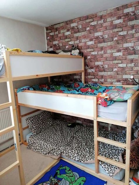 A SINGLE mum made her boys a triple bunk bed after she couldn’t find anything suitable in the shops – and people are in awe over her creativity.  Sarah Brotherton explained she wanted a triple bunk as her three boys, Cyrus nine, Griffin, five, and Lucian, three, share one room, but she struggled to find […] Kura Triple Bunk Bed, Three Bed In One Room, Ikea Bunk Bed Hack, White Wooden Bunk Beds, Ikea Bunk Bed, Kura Hack, Ikea Kura Hack, Ikea Loft Bed, Triple Bunk Beds