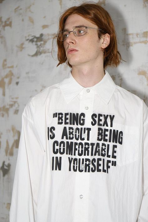 Showcase your individuality with the Spray Painted Slogan Shirt, a unique meld of edgy design and luxurious comfort. Emblazoned with an iconic slogan, mimicking the raw texture of spray paint, this shirt boasts a drop-shoulder and a slightly oversized fit, ensuring an effortlessly modern and relaxed look. Expertly crafted from premium 100% cotton fabric, this piece promises both style and supreme comfort. Iconic slogan with spray paint texture Drop-shoulder design Slightly oversized fit Made of Spray Painting Clothes, Spray Paint Clothes, Spray Paint Texture, Slogan Clothing, Fw 2024, Raw Texture, Christian Merch, Paint Texture, Paint Shirts