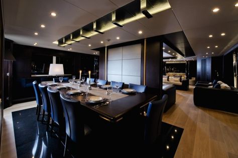 Amazingly, the dining area onboard can seat up to ten guests with ease. Penthouse Aesthetic, Black Yatch Boat Luxury, Luxury Yacht Interior, Luxurious Dining Room, Yacht Interior Design, Room Deco, Dark House, Yacht Interior, Apartment Aesthetic