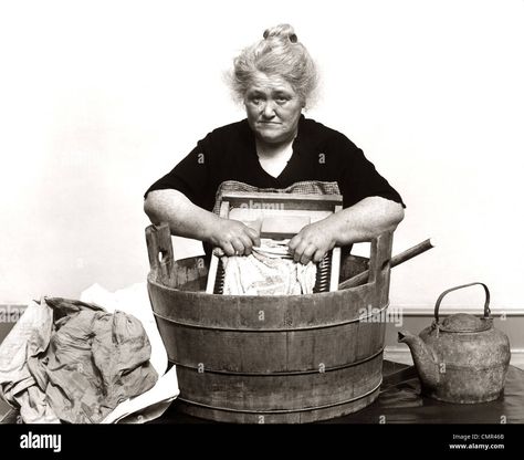 Download this stock image: 1920s 1930s 1940s SENIOR WOMAN WASHING CLOTHES IN OLD FASHIONED WOODEN TUB AND WASHBOARD - CMR46B from Alamy's library of millions of high resolution stock photos, illustrations and vectors. Old Fashioned Bathtub, Washing Clothes By Hand, Old Washboards, Wooden Tub, Clothes Print, Dark Alice In Wonderland, Wash Tubs, Vintage Laundry, Wash Day