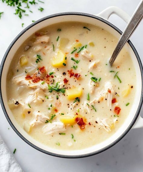 Make a rich and creamy chicken and bacon potato soup with this easy recipe! Perfect for a comforting meal, packed with flavor, and ready in under an hour. Rotisserie Chicken Potato Soup, Chicken And Potato Soup Crockpot, Creamy Chicken And Potato Soup, Chicken Soup With Potatoes, Potato And Chicken Soup, Creamy Chicken Potato Soup, Potato Chicken Soup, Chicken And Potato Soup, Bacon Potato Soup