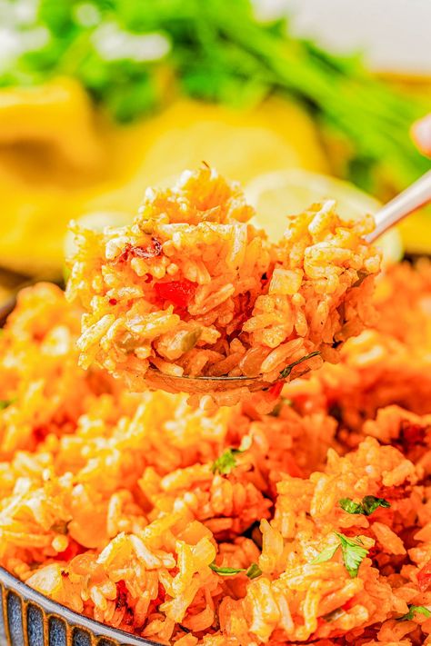 Spanish Rice - 🎉😋🙌🏻 Often interchangeably called 'Mexican rice', this perfectly cooked rice recipe has bits of onions, red bell peppers, jalapenos, and is seasoned with garlic, cumin, and oregano for tons of great FLAVOR! Ready in 25 minutes and made in just one skillet with a handful of ingredients, it's always a family favorite side dish! Serve it with your fave Mexican recipe, use it inside burritos, or for any recipe that calls for seasoned rice.'Mexican rice', this perfectly cooked rice Spanish Jasmine Rice, Red Spanish Rice, Latino Rice Recipes, Cheesy Spanish Rice, Crock Pot Mexican Rice, Knorr Mexican Rice Recipe, Rice With Bell Peppers, Spanish Rice Seasoning, Spanish Rice With Chicken