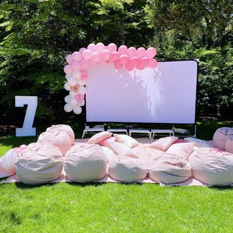 Outdoor Movie Theme Birthday Party, Preppy Movie Night Party, Pink Bonfire Party, Pink Movie Birthday Party, Outside Movie Night Party Seating, Movie Night In Pool, Kids Movie Night Ideas, Outside Movie Night Party, Pink Movie Night