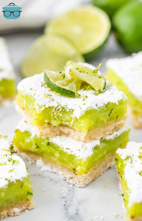 A few Lime Bars in a stack with one missing a bite. Desserts With Lime, Lime Recipes Healthy, Candied Limes, Lime Bars Recipe, Lime Dessert Recipes, Creamy Lemon Bars, Key Lime Bars, Key Lime Recipes, Classic Lemon Bars